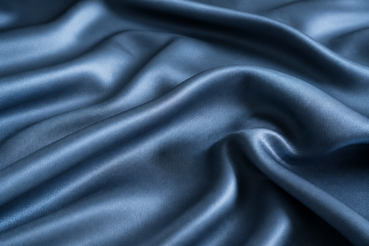 Flowing slate blue silk folds