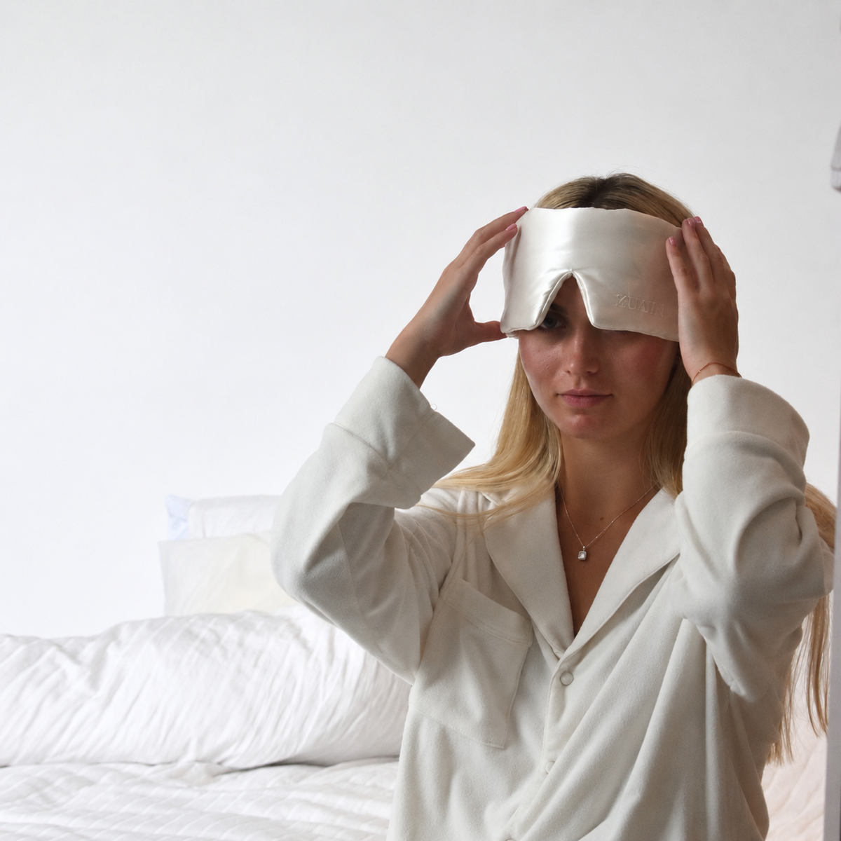 Organic Mulberry Silk Sleep Mask in Ivory White, person
